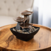 Tabletop water fountain with LED crystal ball and decorative pebbles